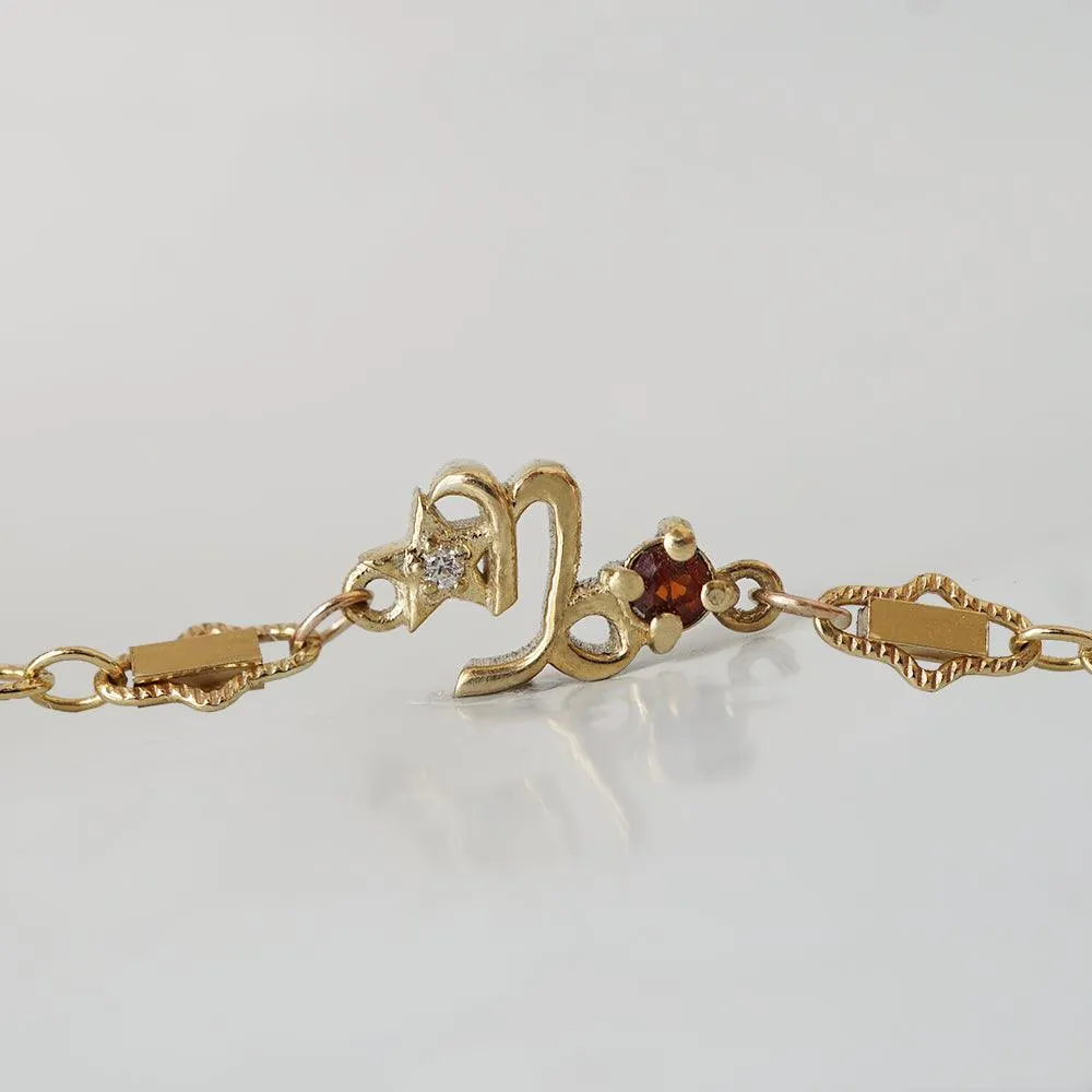 14K Capricorn Horoscope Birthstone Bracelet (Garnet   Blue Topaz)