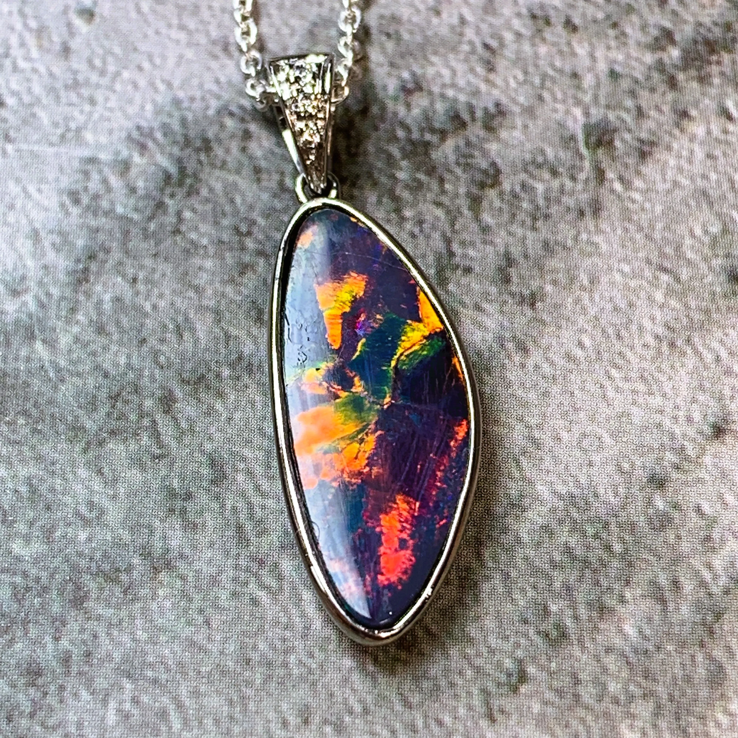 14kt White Gold Red Fiery Opal and Diamond pendant