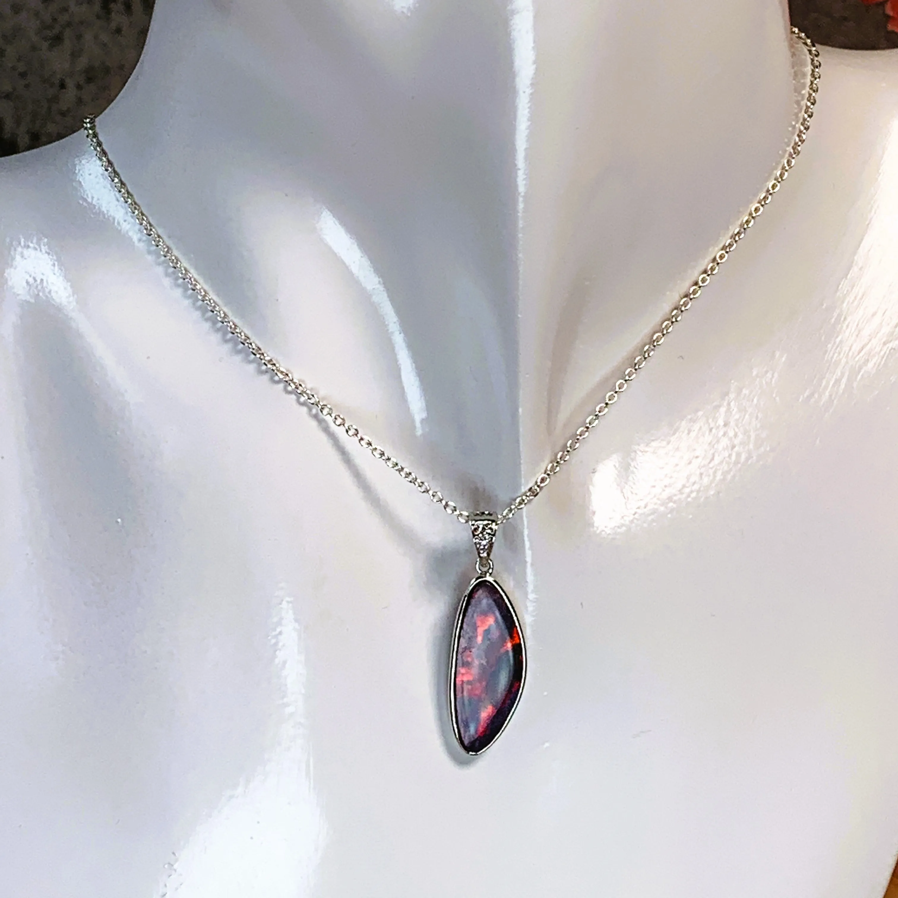 14kt White Gold Red Fiery Opal and Diamond pendant