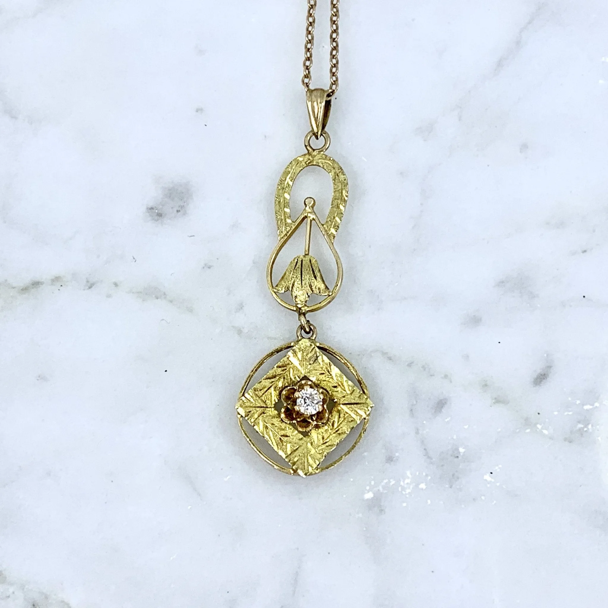 1930s Diamond Pendant in 10K Yellow Gold Filigree. Drop Pendant with Art Nouveau Style.