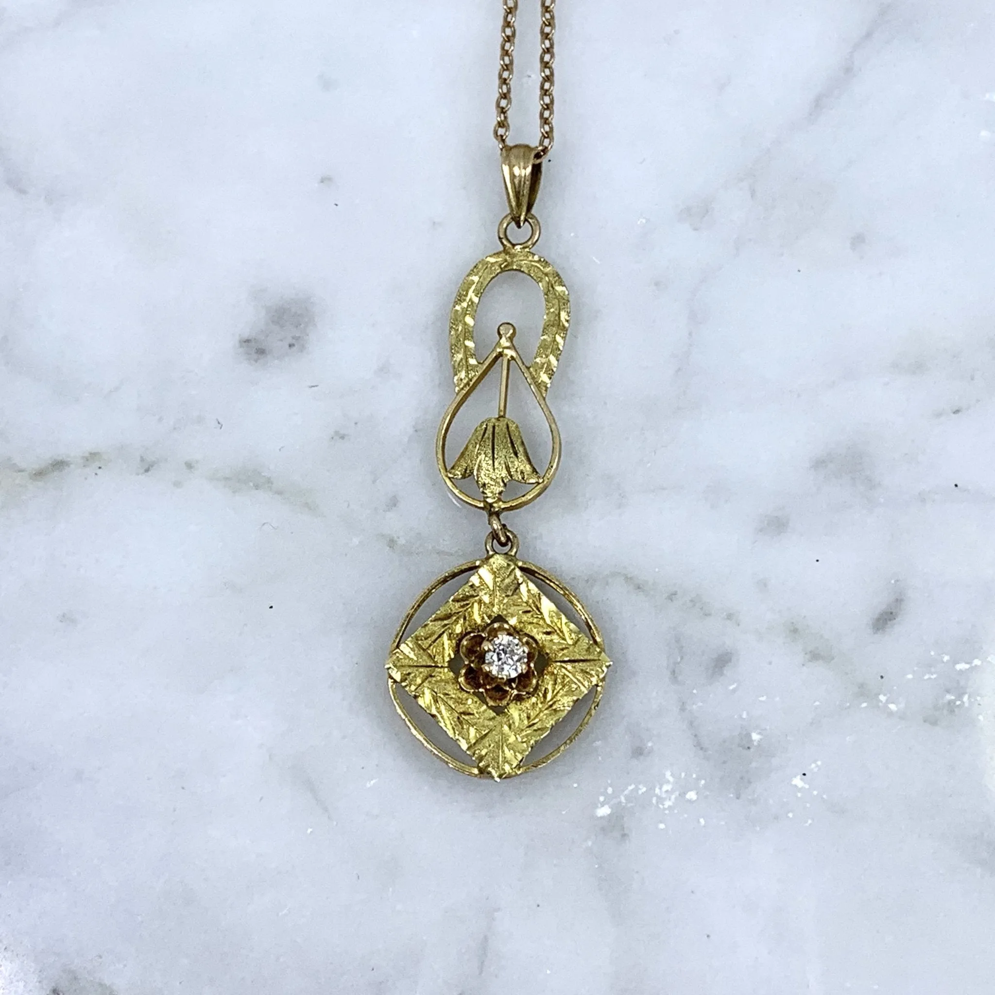 1930s Diamond Pendant in 10K Yellow Gold Filigree. Drop Pendant with Art Nouveau Style.