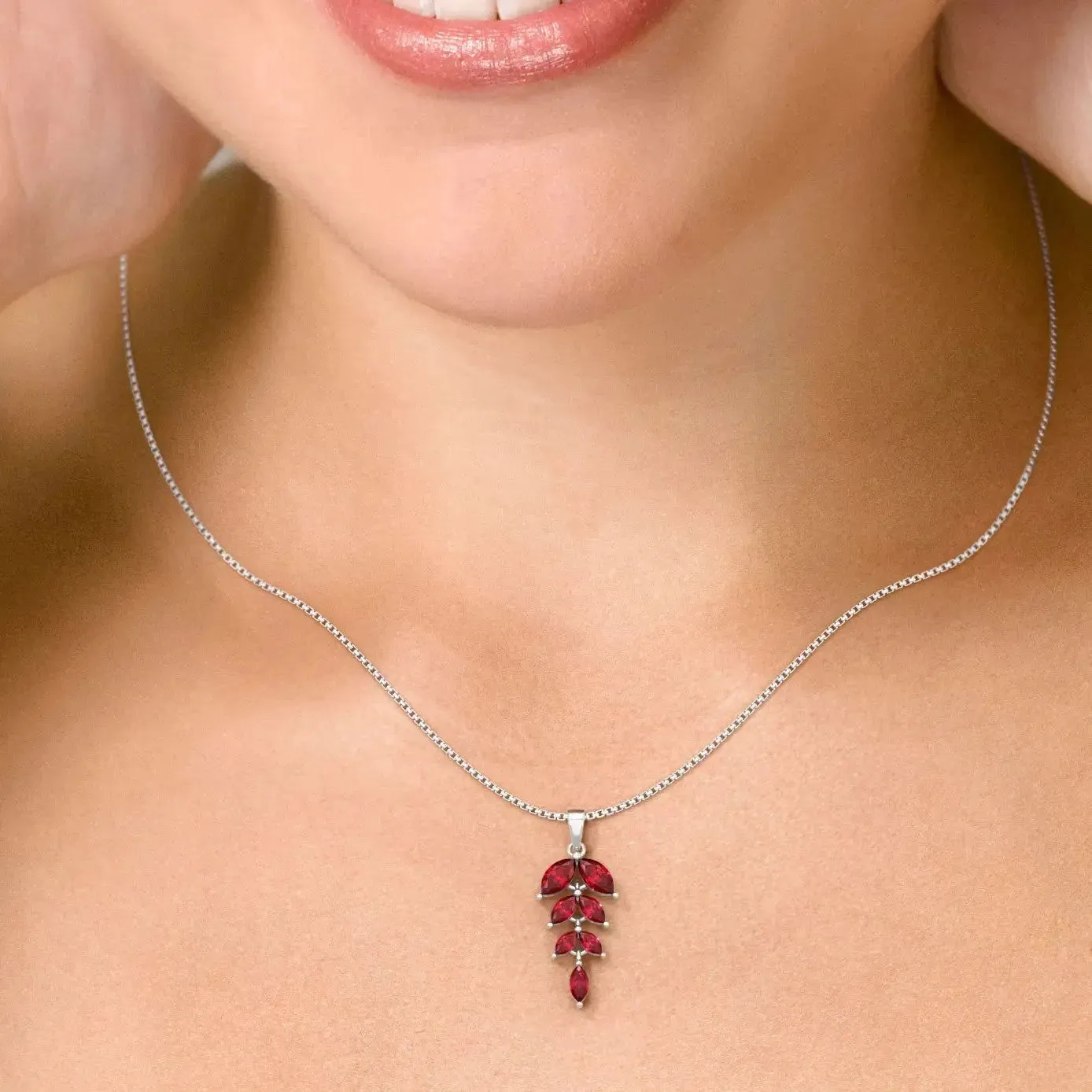 Sparkling Strength: Garnet Marquise Leaf Pendant