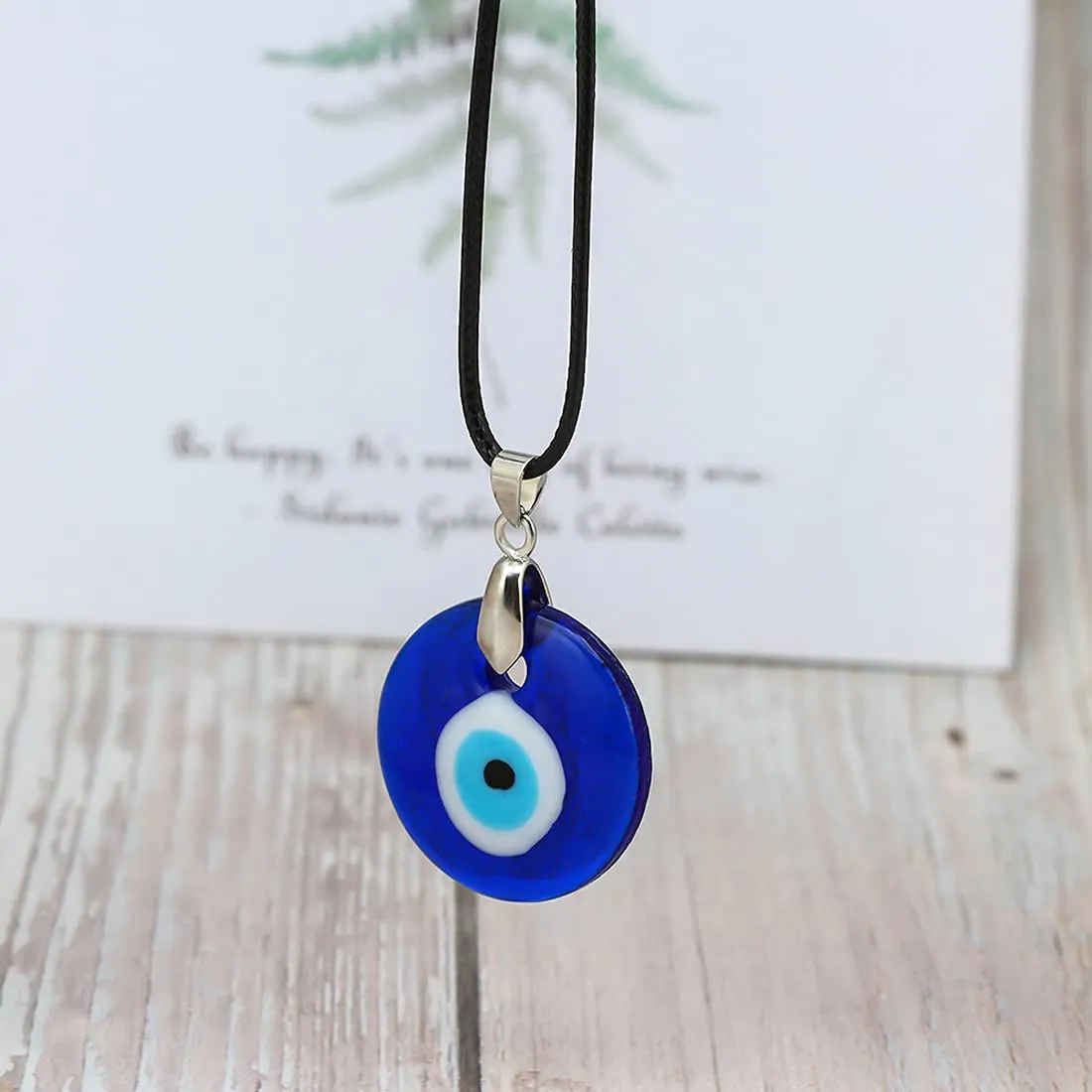 Yellow Chimes Evil Eye Pendant for WomenFashion Evil Eye Locket Pendant Charm Black Leather Rope Pendant for Men and Women.