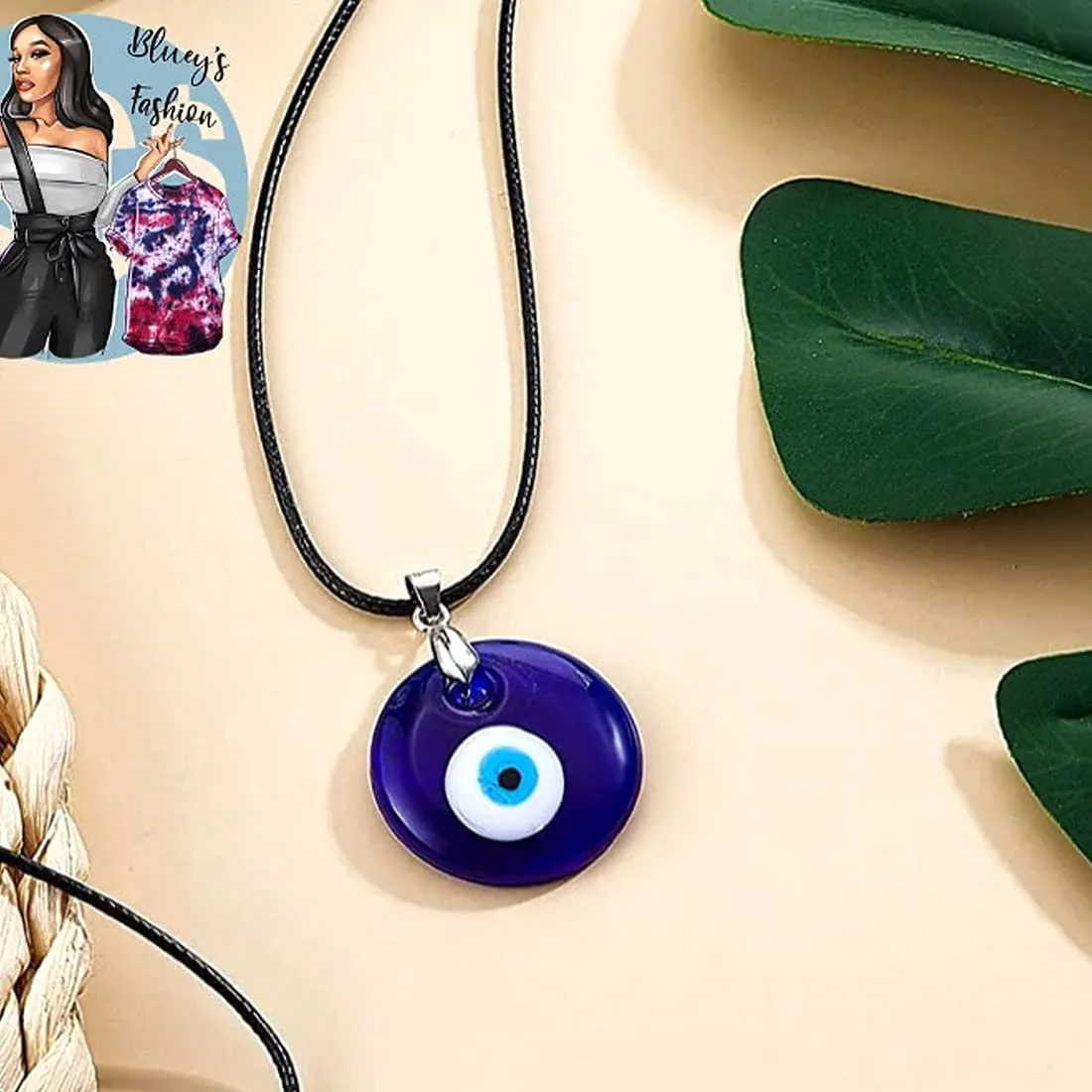 Yellow Chimes Evil Eye Pendant for WomenFashion Evil Eye Locket Pendant Charm Black Leather Rope Pendant for Men and Women.